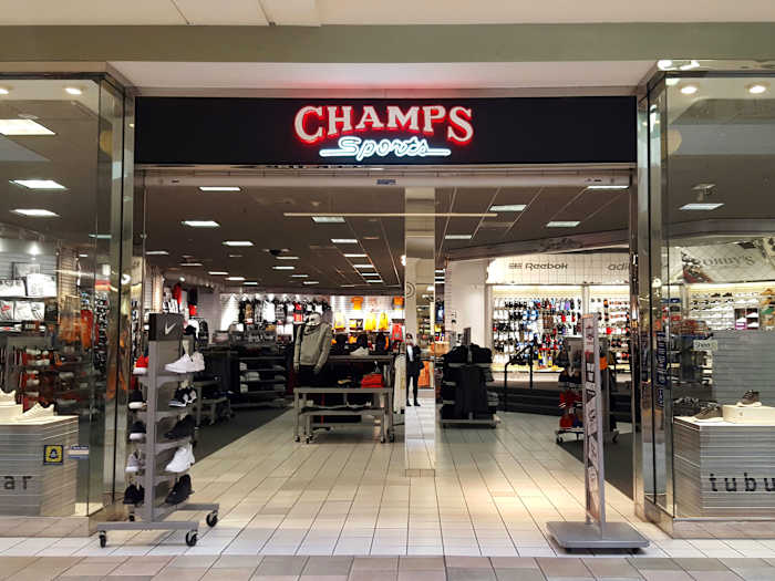 Outside of a Champs Sports store.